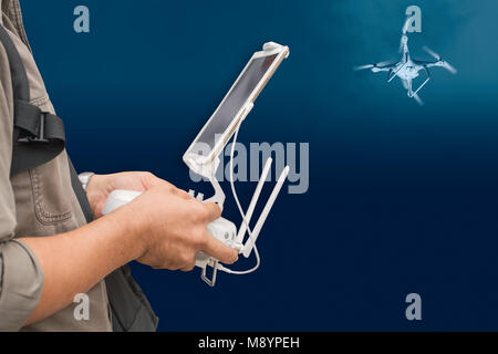people using remote control drone to aerial video professional Stock Photo