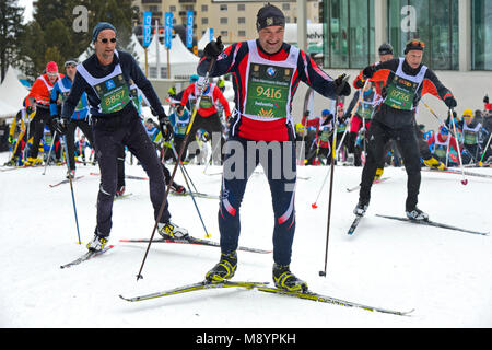 Cross country skiers at the Engadin Skimarathon on the climb to the Stazer Wald hill, 50th Engadin Skimarathon, 11 March 2018, St. Moritz, Switzerland Stock Photo