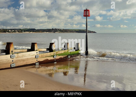 Groynes on Dawlish Warren beach, looking towards Exmouth. Stock Photo