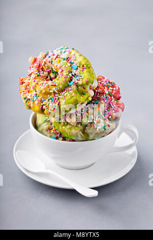 Unicorn donuts in a cup Stock Photo