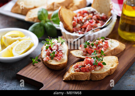Roasted tomatoes bruschetta with thyme Stock Photo