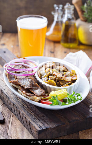 Gyro plate with meat on a pita Stock Photo