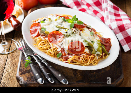 Baked pasta with cheese and pepperoni Stock Photo