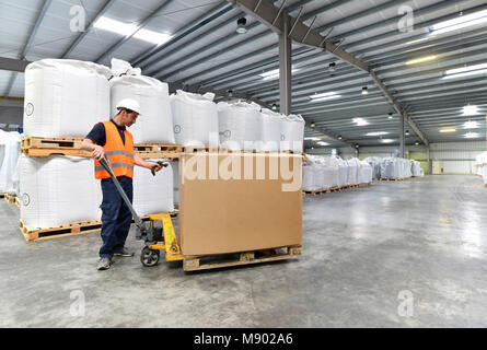 worker in the logistics industry -  scanning barcode Stock Photo