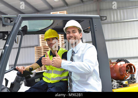 group of manager and worker in the logistics industry work in a warehouse with chemicals Stock Photo