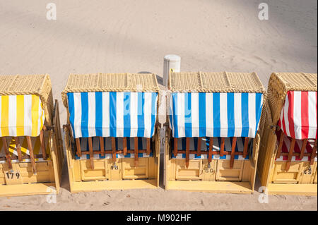 Roofed wicker beach chairs on the beach, Travemuende, Baltic Sea, Schleswig-Holstei, Germany, Europe Stock Photo