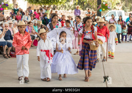 San Juan Teitipac, Oaxaca, Mexico - Children perform a pretend wedding during the town's Linguistic and Heritage Fair. The purpose of the fair was to  Stock Photo