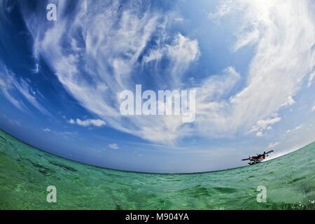 Hydroplane Take-off. Maldives, The Indian Ocean Stock Photo
