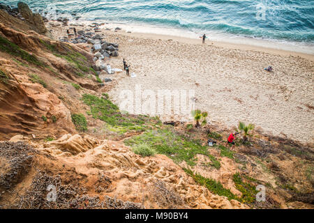 SAN DIEGO, CALIFORNIA - MARCH 11, 2018: View of beautiful San Diego in southern California seen from Sunset Cliffs in Point Loma with surfers. Stock Photo