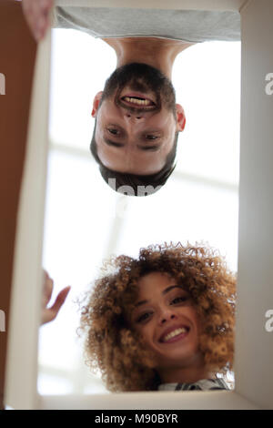 View from the bottom of the newlyweds looking inside the box. Photo with copy space Stock Photo