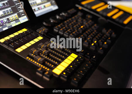Closeup of lighting desk used in lighting design to control stage lights. Selective focus. Stock Photo