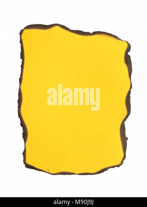 Yellow burned paper isolated on white background with clipping path Stock Photo