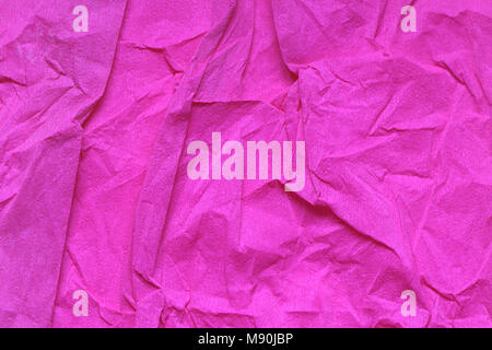 Background made from sheet of crushed pink paper Stock Photo