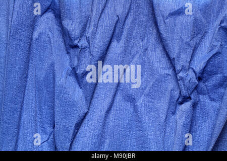 Background made from sheet of crushed blue paper Stock Photo
