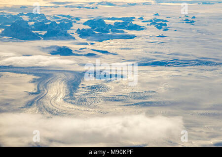 View from Virgin Atlantic on the way from Gatwick, North terminal to Las Vegas looking out of the window from 35,000 ft at a Glaciar in Southern Green Stock Photo