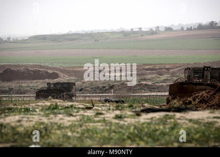 Jabalya, Gaza. 20th Mar, 2018. An Israeli D9 bulldozer patrols along the border with the northern Gaza Strip. Tension surged in Gaza. Credit: Nidal Alwaheidi/Pacific Press/Alamy Live News Stock Photo