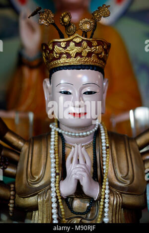 Tu An Buddhist temple.  Quan Am bodhisattva of compassion or goddess of Mercy. Stock Photo