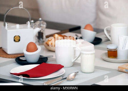 Breakfast on a table at a hotel. Stock Photo