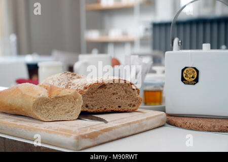 Breakfast on a table at a hotel. Bred and tea. Stock Photo