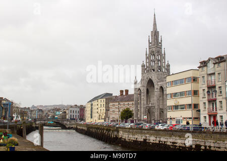 Parliament Bridge and the narrow streets of Cork Ireland on the Father Mathew Quay alongside the River Lee that runs through the city Stock Photo