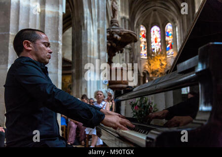 Concert and sufi poetry reading in Saint-Merry church, Paris.  ThÃ©ophile de Wallensbourg. Stock Photo