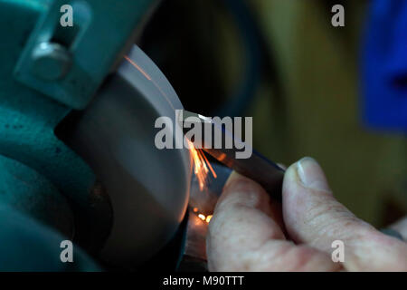 Man working on a wood lathe. Stock Photo
