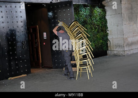 A man carrying a difficult load. Stock Photo