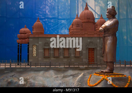 Statue of Swami Vivekananda with replica of Vivekananda Rock Memorial Kanyakumari at Pune Stock Photo