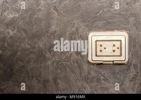 The condition of electrical outlets on the outside of the building and is protected by a plastic cover. Stock Photo
