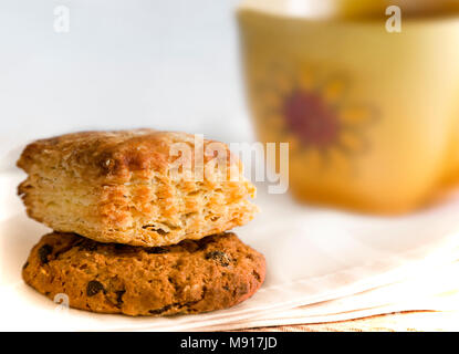 On the table on a napkin with a Cup of tea and delicious biscuits. Stock Photo