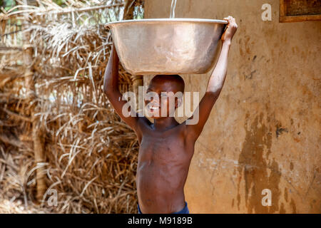 Collecting water in a Zou province village, Benin. Stock Photo