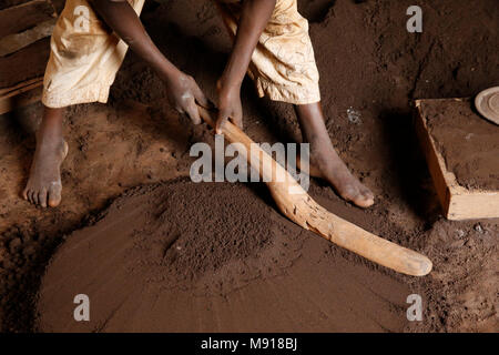 Smithy in Bohicon, Benin. Child worker. Stock Photo