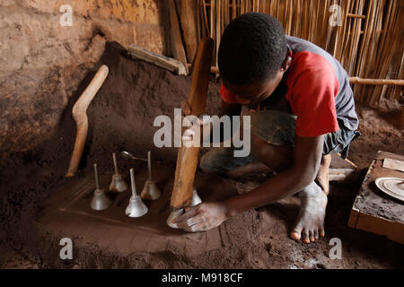 Smithy in Bohicon, Benin. Child worker. Stock Photo