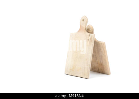 Two used wooden cutting boards isolated on white background. Kitchen accessories and equipment. Stock Photo