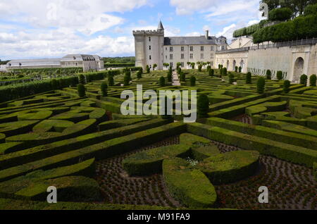 Villandry, Loire valley, France June 2017. View of the castle from the park with its large fountain, highlighting the pleasant geometry of the gardens. Stock Photo