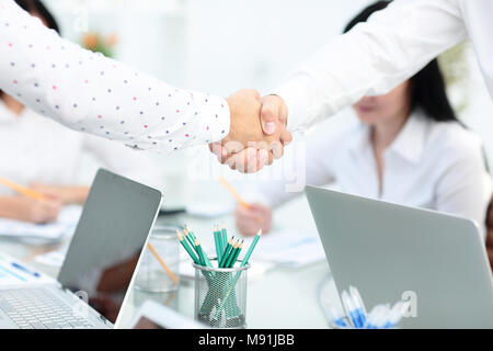 Business partnership meeting concept. Image businessmans handshake. Successful businessmen handshaking after good deal. Horizontal, blurred background Stock Photo