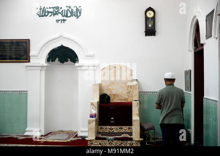 Al noor mosque.  Muslim man praying alone.  Hanoi. Vietnam. Stock Photo