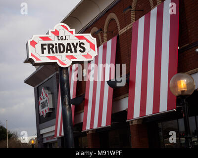 Cardiff, South Wales - March 21, 2018: TGI Fridays exterior and logo. TGI Friday's is an American restaurant chain focusing on casual dining. Stock Photo