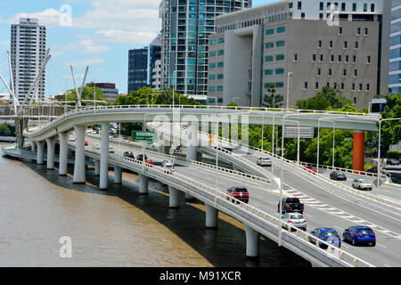 Brisbane, Queensland, Australia - January 6, 2018. View of Pacific motorway on river waterfront in Brisbane, with modern commercial and residential bu Stock Photo
