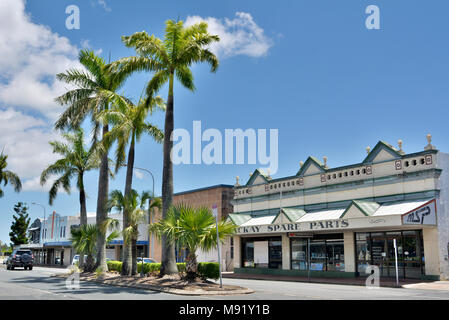 Mackay, Queensland, Australia - December 28, 2017. Street view in Mackay, QLD, with historic art deco buildings, commercial properties, car and palm t Stock Photo