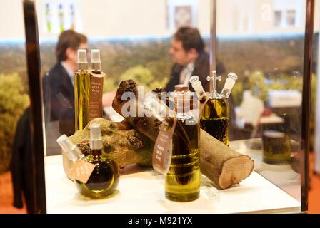 Madrid, Spain. 21st Mar, 2018. Olive oil bottles are presented at the World Olive Oil Exhibition in Madrid, Spain, on March 21, 2018. The World Olive Oil Exhibition was held in Madrid on Wednesday and Thursday. Some 6,000 visitors from more than 30 countries and regions are expected to come to this important international event of olive oil. Credit: Guo Qiuda/Xinhua/Alamy Live News Stock Photo
