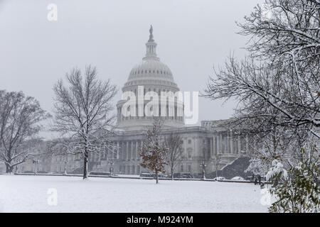 Washington, District of Columbia, USA. 21st Mar, 2018. The United States Capitol Building is seen on a snowy afternoon in Washington, DC on March 21, 2018. Credit: Alex Edelman/CNP Credit: Alex Edelman/CNP/ZUMA Wire/Alamy Live News Stock Photo