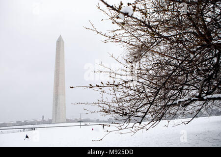 (180321) -- WASHINGTON, March 21, 2018 (Xinhua) -- The field near the Washington Monument is covered with snow in Washington, DC, the United States, on March 21, 2018. A late-season nor'easter, the fourth of its kind in three weeks, is targeting the northeast United States on Wednesday, bringing heavy snow and strong winds to the region. Washington, which is already snow-covered, is expected to see up to 6 inches of snow, as some models suggesting much high totals for the capital. Federal offices are closed for the snowstorm as the White House announced early Wednesday that all public events Stock Photo