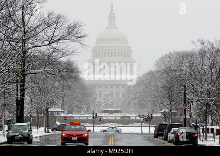 (180321) -- WASHINGTON, March 21, 2018 (Xinhua) -- The Capitol is covered with snow in Washington, DC, the United States, on March 21, 2018. A late-season nor'easter, the fourth of its kind in three weeks, is targeting the northeast United States on Wednesday, bringing heavy snow and strong winds to the region. Washington, which is already snow-covered, is expected to see up to 6 inches of snow, as some models suggesting much high totals for the capital. Federal offices are closed for the snowstorm as the White House announced early Wednesday that all public events for the day were cancelled. Stock Photo
