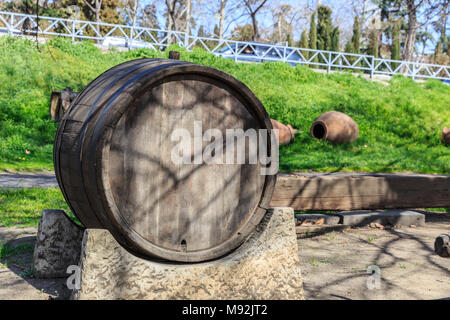 Oak old barrel lying on the street Stock Photo
