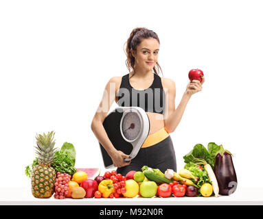 Premium Photo  Health diet and woman with scale and apple to