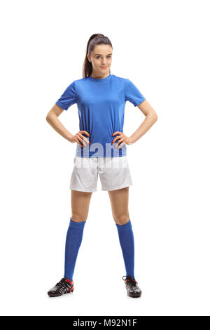 Full length portrait of a female soccer player isolated on white background Stock Photo