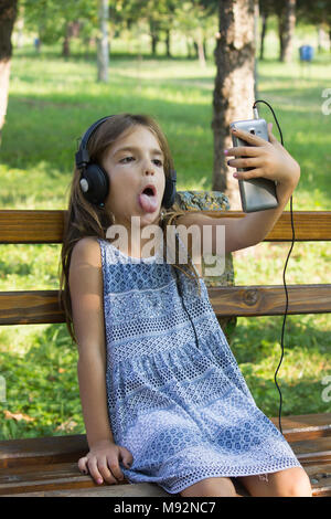 girl take a selfie in park Stock Photo