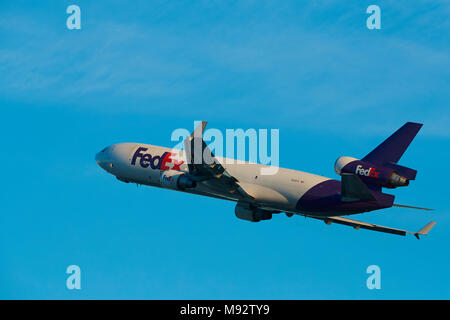 FedEx MD11 Cargo Jet Taking Off From Los Angeles International Airport,   LAX, California, USA. Stock Photo