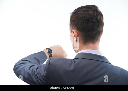 Business man check time. Man in suit look on wrist with watch Stock Photo